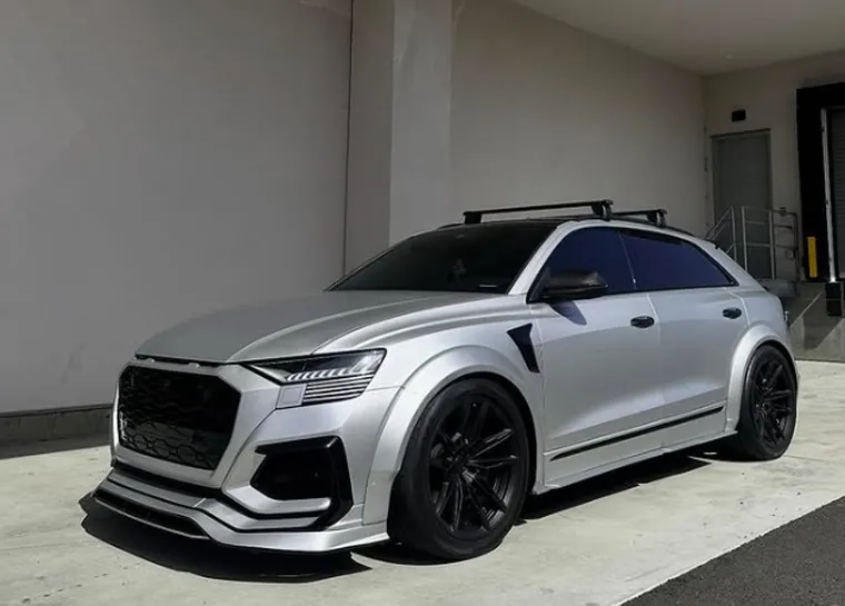 Silver widebody Audi SUV with a satin finish and black wheels, photographed by SFS Bay Area